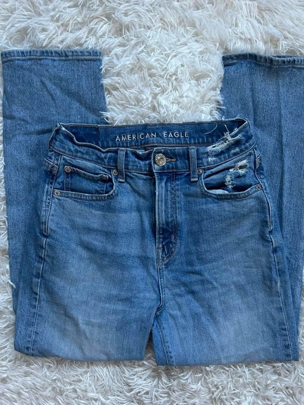American Eagle Outfitters Light Blue High-Rise Distressed Jeans